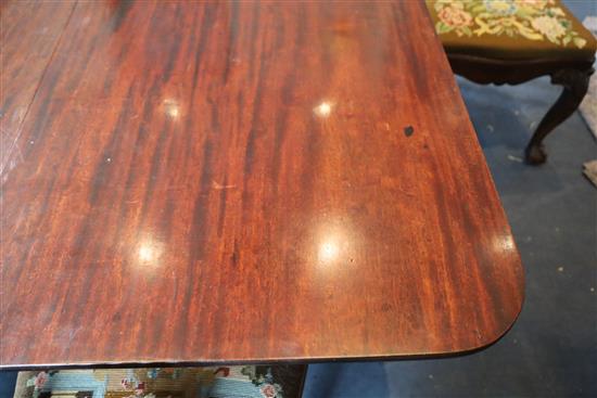A Regency mahogany triple pillar extending dining table, extends to 10ft x 3ft 9in. H.2ft 4in.